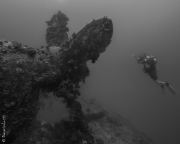 Giant propeller and diver, Truk Lagoon, Micronesia